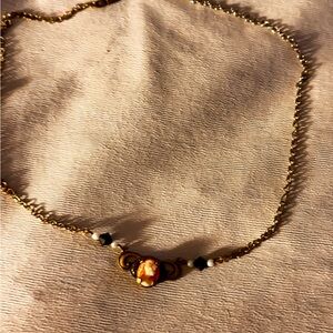 Elegant Gold and Black Necklace